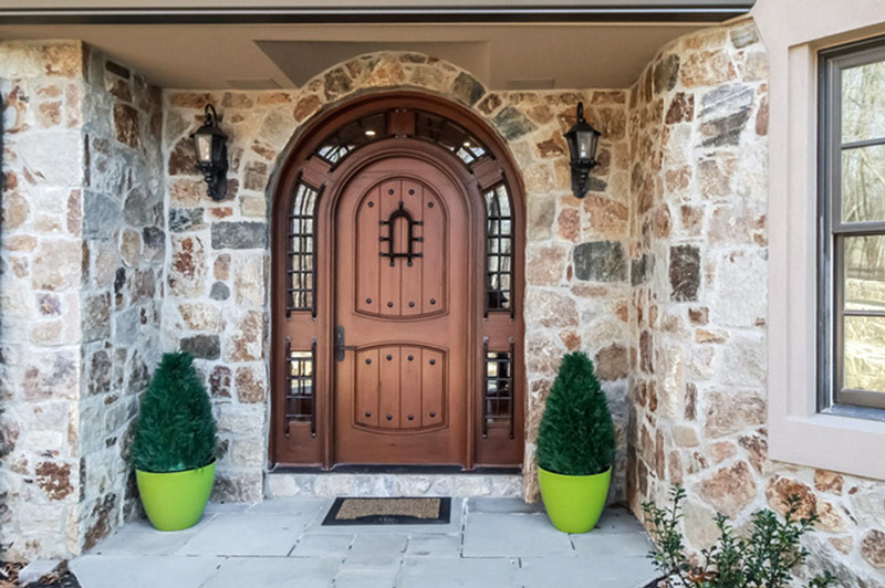 Teak_Arched_Top_Door_with_Surround_the_Pompano_in_Connecticut.jpg