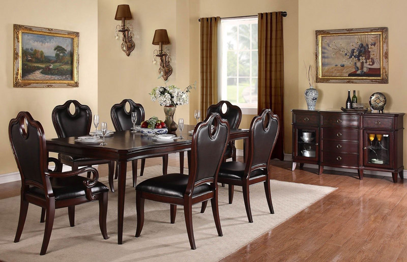 Glamorous-Formal-Dining-Room-Sets-with-Elegant-Chairs-in-Black-Color-Furnished-with-Elongated-Table-Decorated-with-Table-Decoration-and-Wall-Sconces.jpg